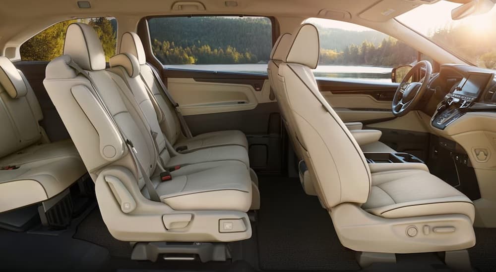 The tan interior of a 2025 Honda Odyssey for sale near Fishers is shown.