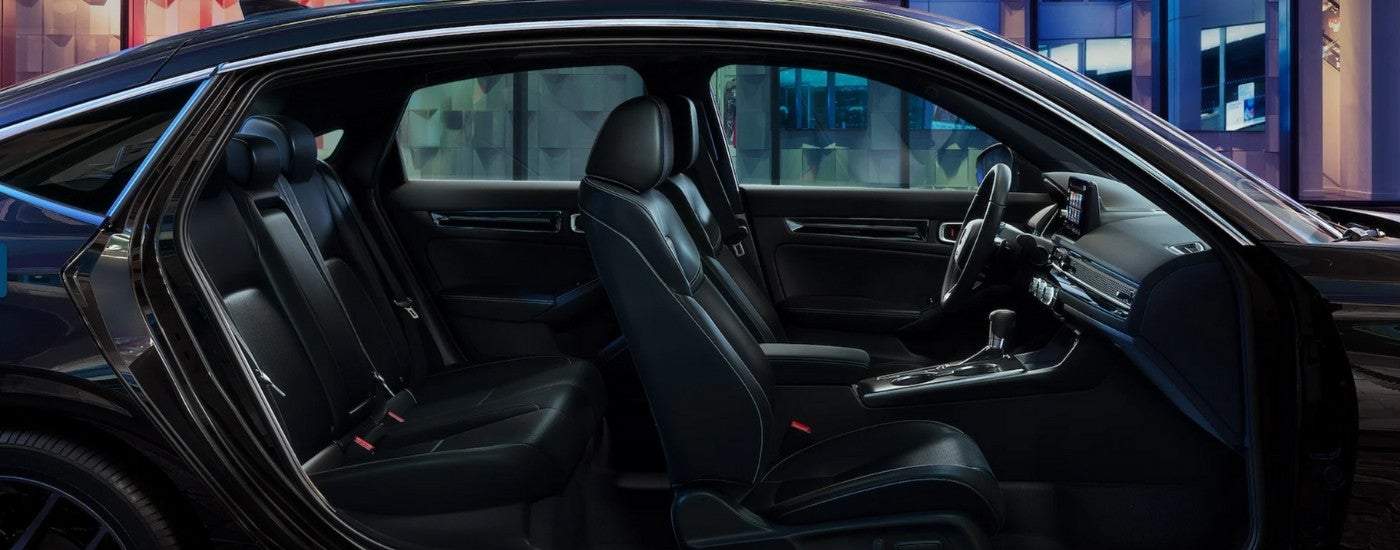 Cutaway view of the interior of a 2024 Honda Civic Hatchback Sport Touring at a Honda dealer near Avon.