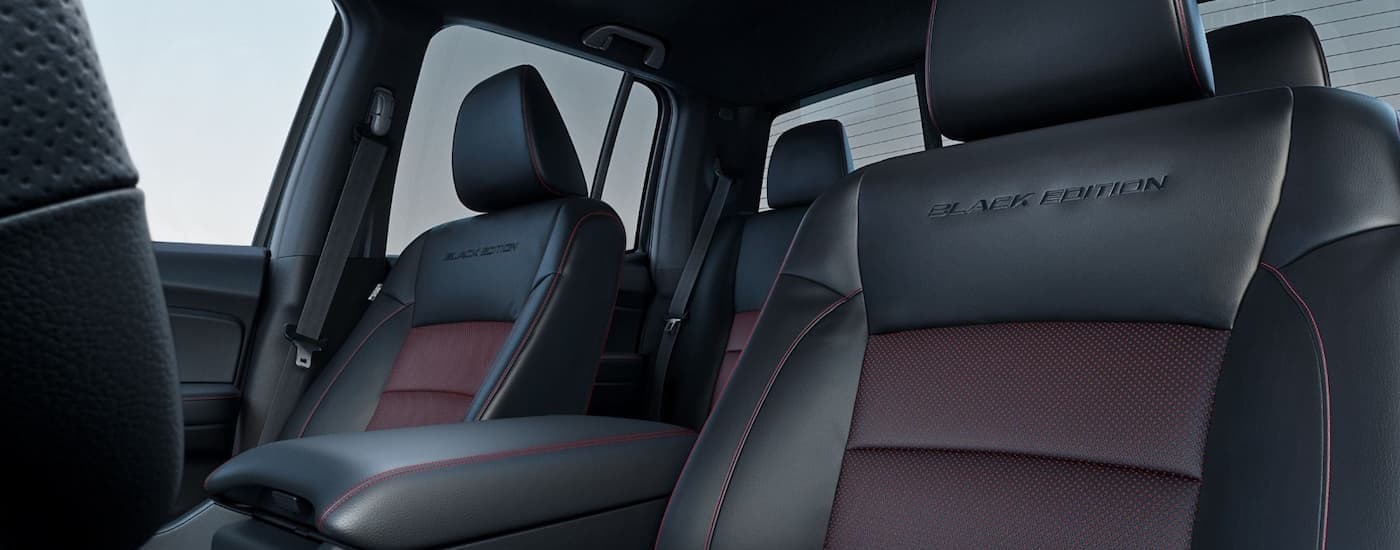 Black and maroon seats in a 2026 Honda Ridgeline Black Edition.
